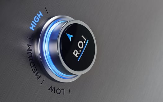 Fotografia de um medidor de "ROI", com as opções low, medium e high. O fundo é cinza e o botão também, além de ser composto pelas cores azul e preto.